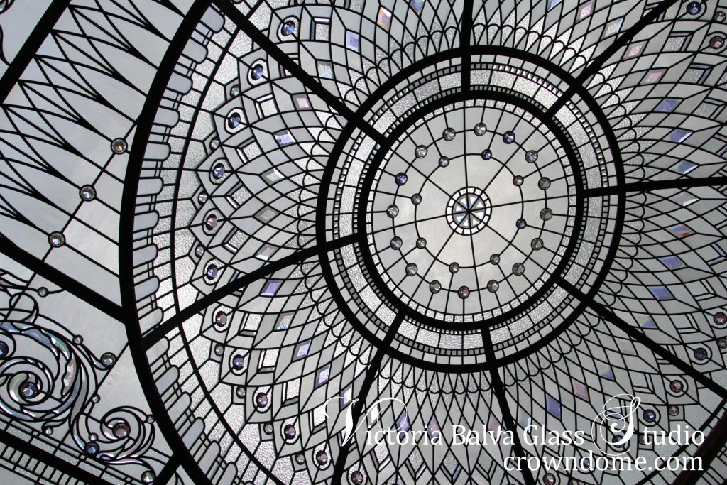 Stained glass dome skylight ceiling intricate design for a grand entrance foyer of a luxury custom built residence