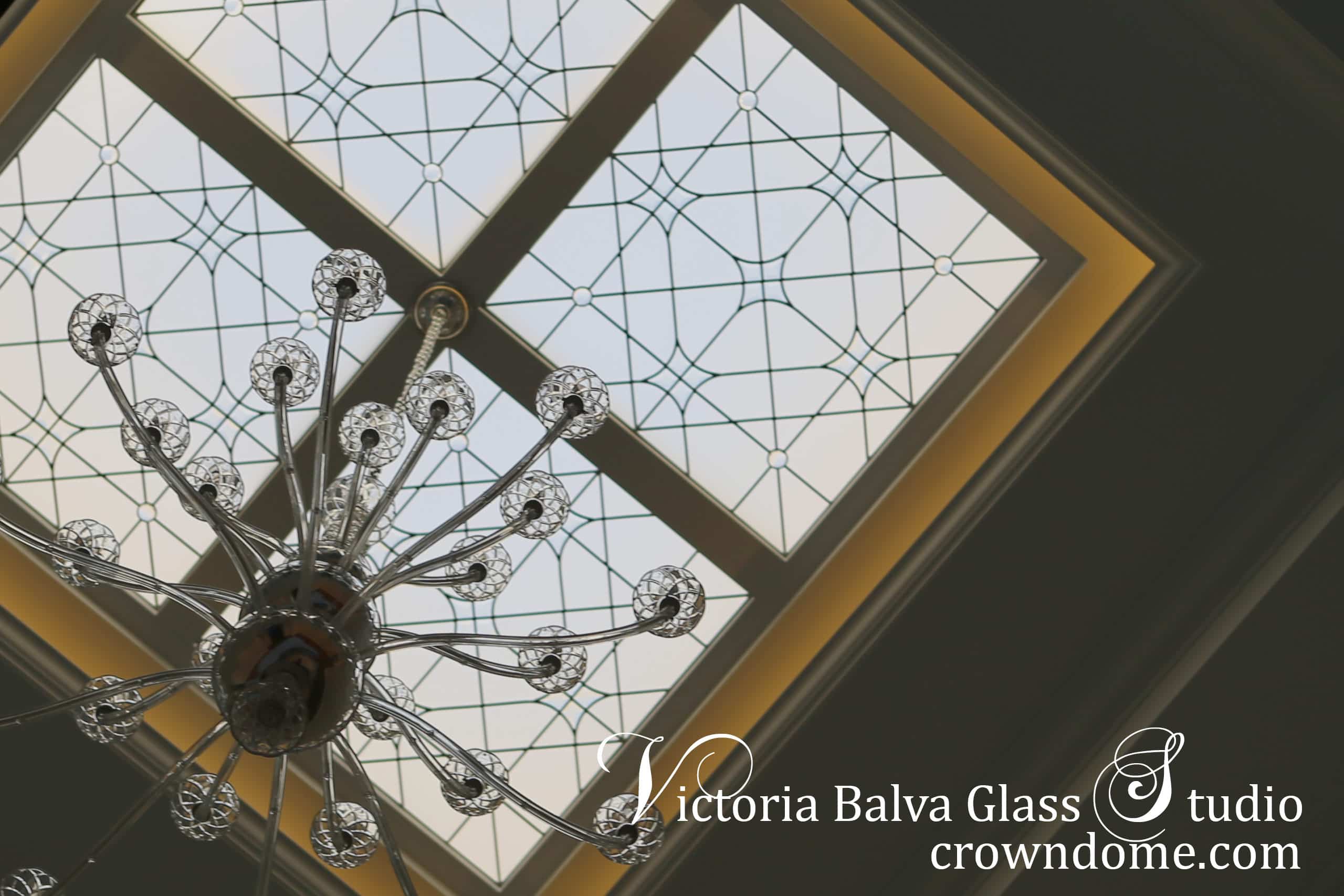 Large leaded glass skylight with hand bevelled glass and crystal jewels for a custom built luxury residence designed by Makow Architect and Mazenga Build