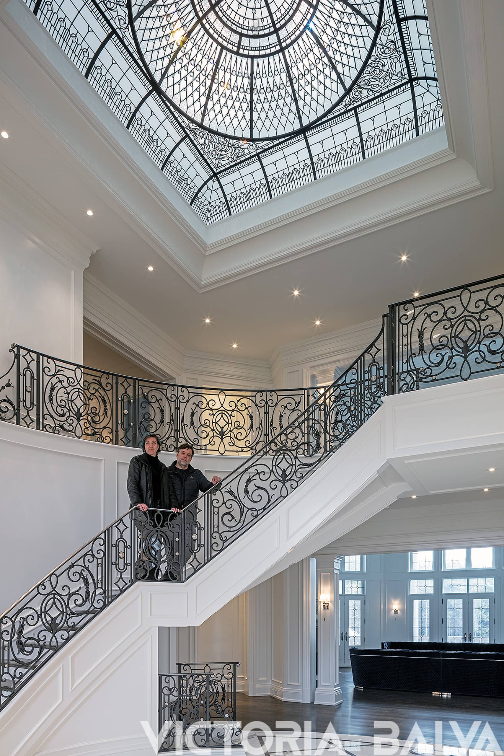 Classic double-height entrance foyer with stained and leaded glass dome design by Victoria Balva