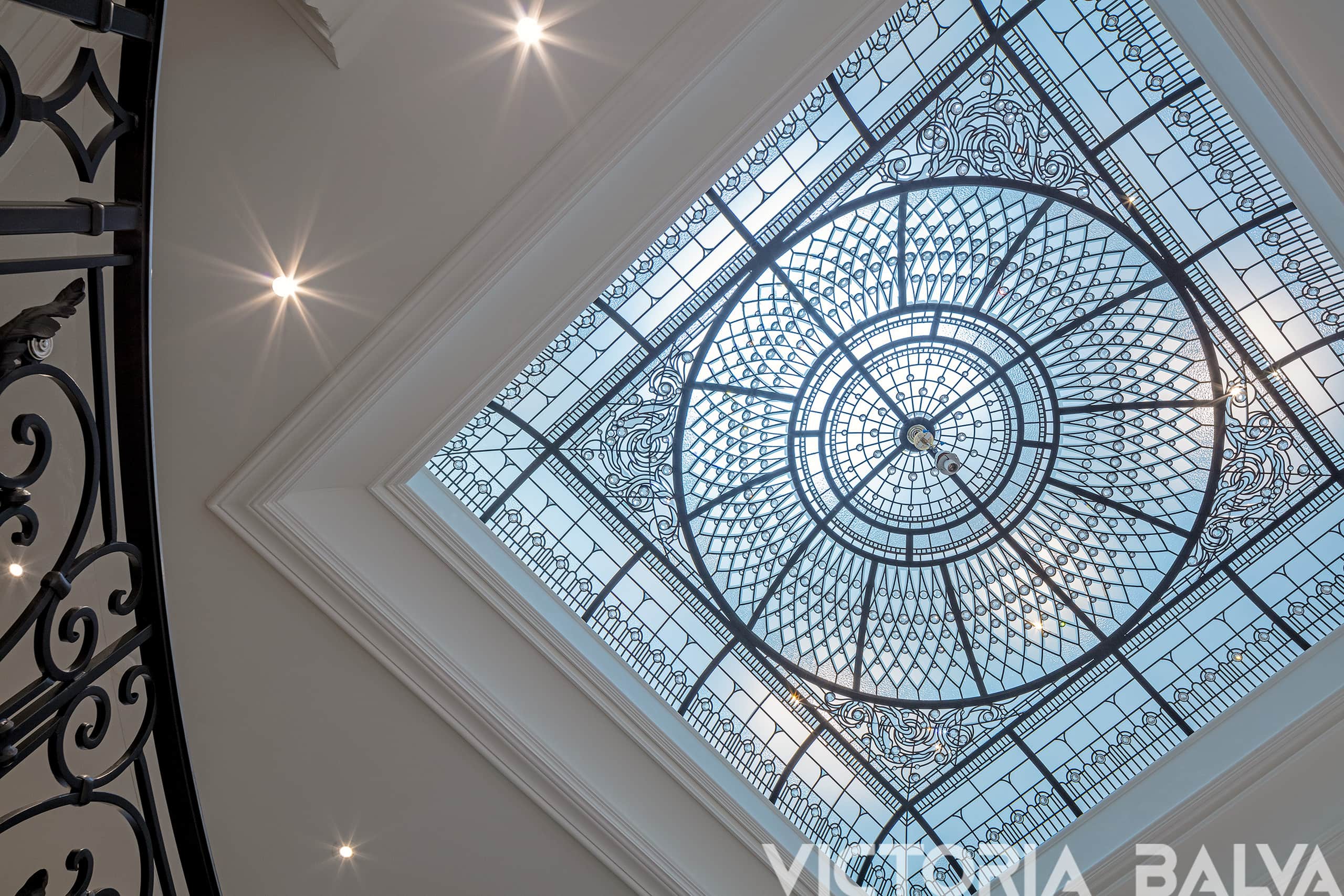 Classic stained glass dome skylight with custom hand bevelled glass for the residence designed Hicks Design Studio