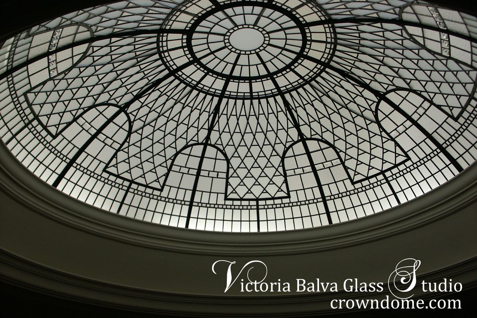 Custom designed stained leaded glass dome skylight Great Neck, Long Island, New York custom built home. A beautiful elegant stained leaded glass dome in clear textured art glass for a decorative glass lay light by architectural glass artist Victoria Balva. Artistic glass Dome installation residential ceiling skylight